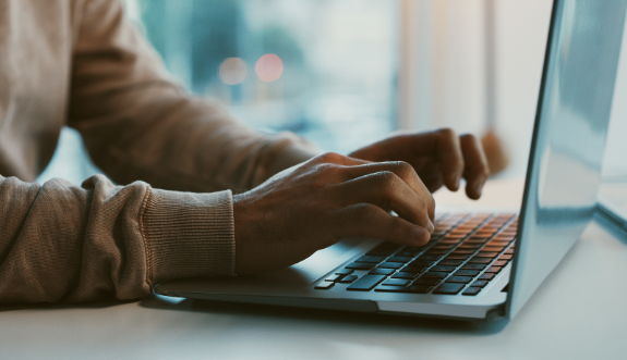 Typing on Laptop